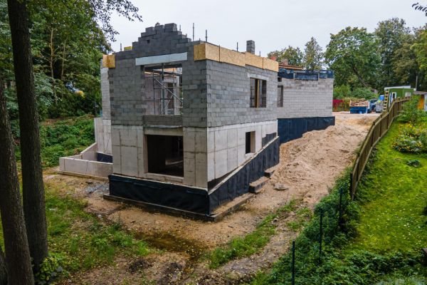 house being built on a piece of land